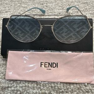 Baby blue and silver Fendi shades.